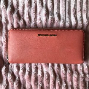Michael Kors coral/peach wristlet wallet